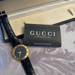 “Gucci” watch with patent black croc strap